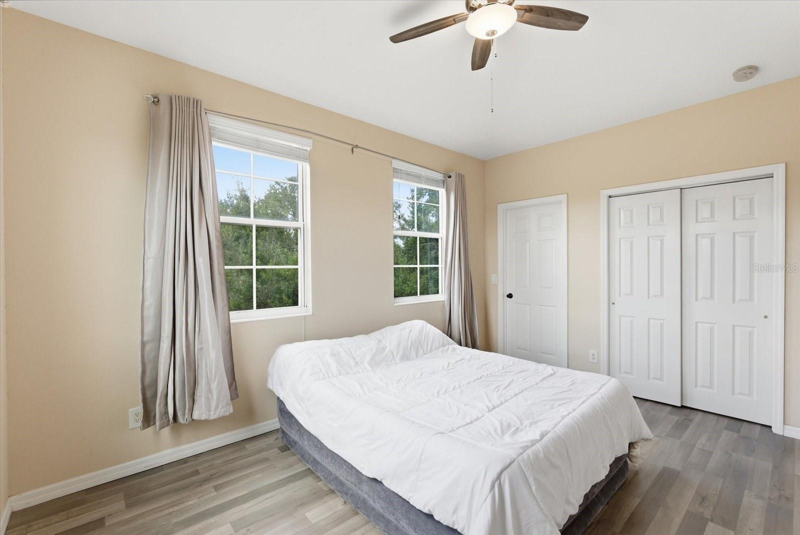 Primary Bedroom with walk in closet AND additional closet