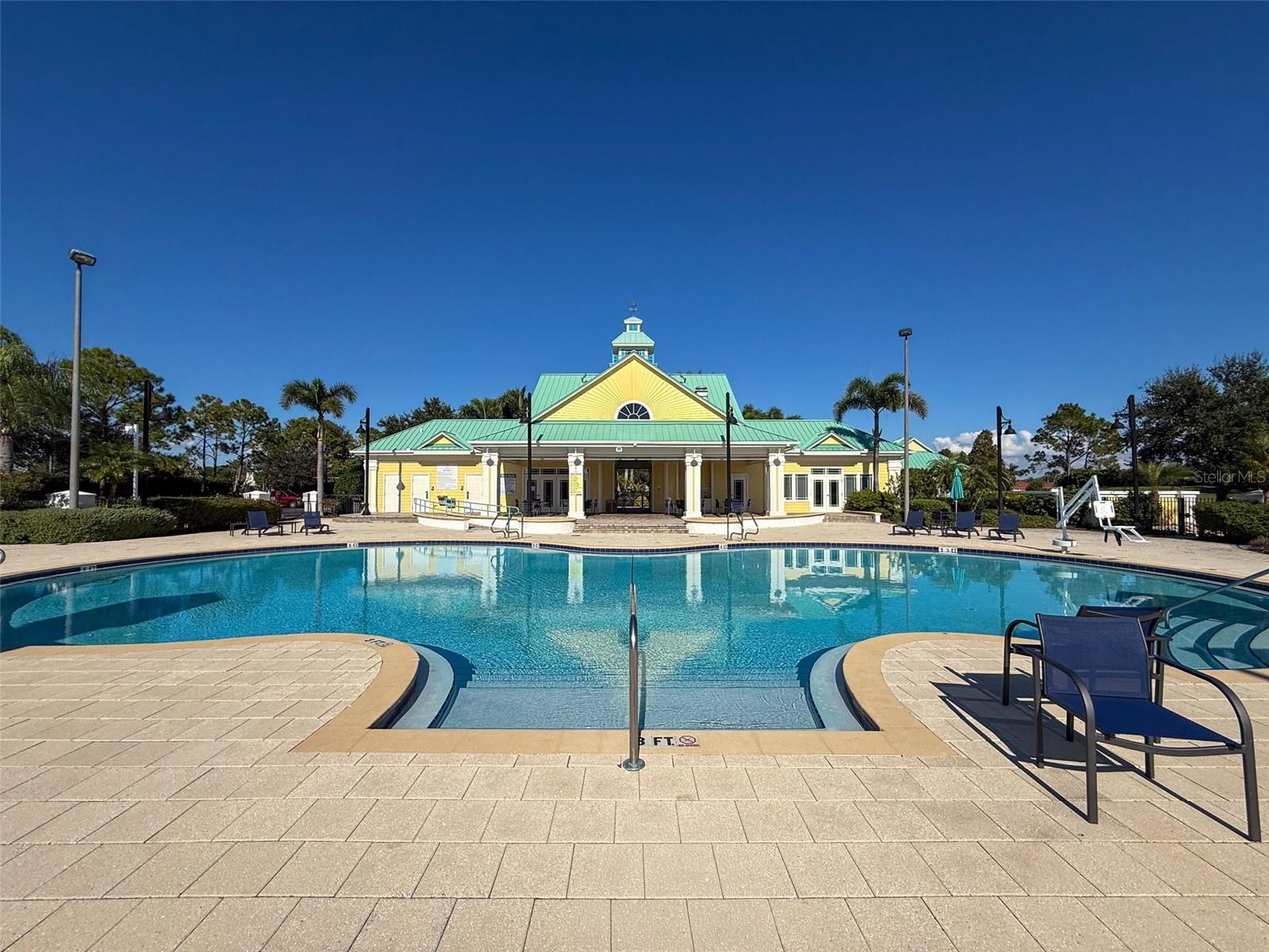 Clubhouse and resort style pool and seating area