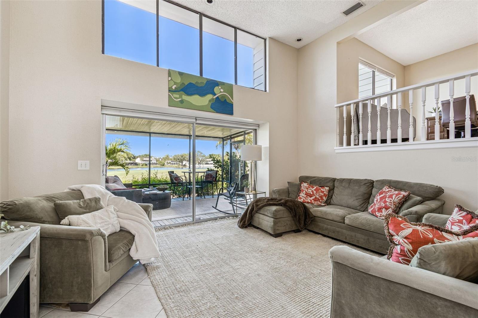 Head on out to the screened lanai for coffee...or cocktails!