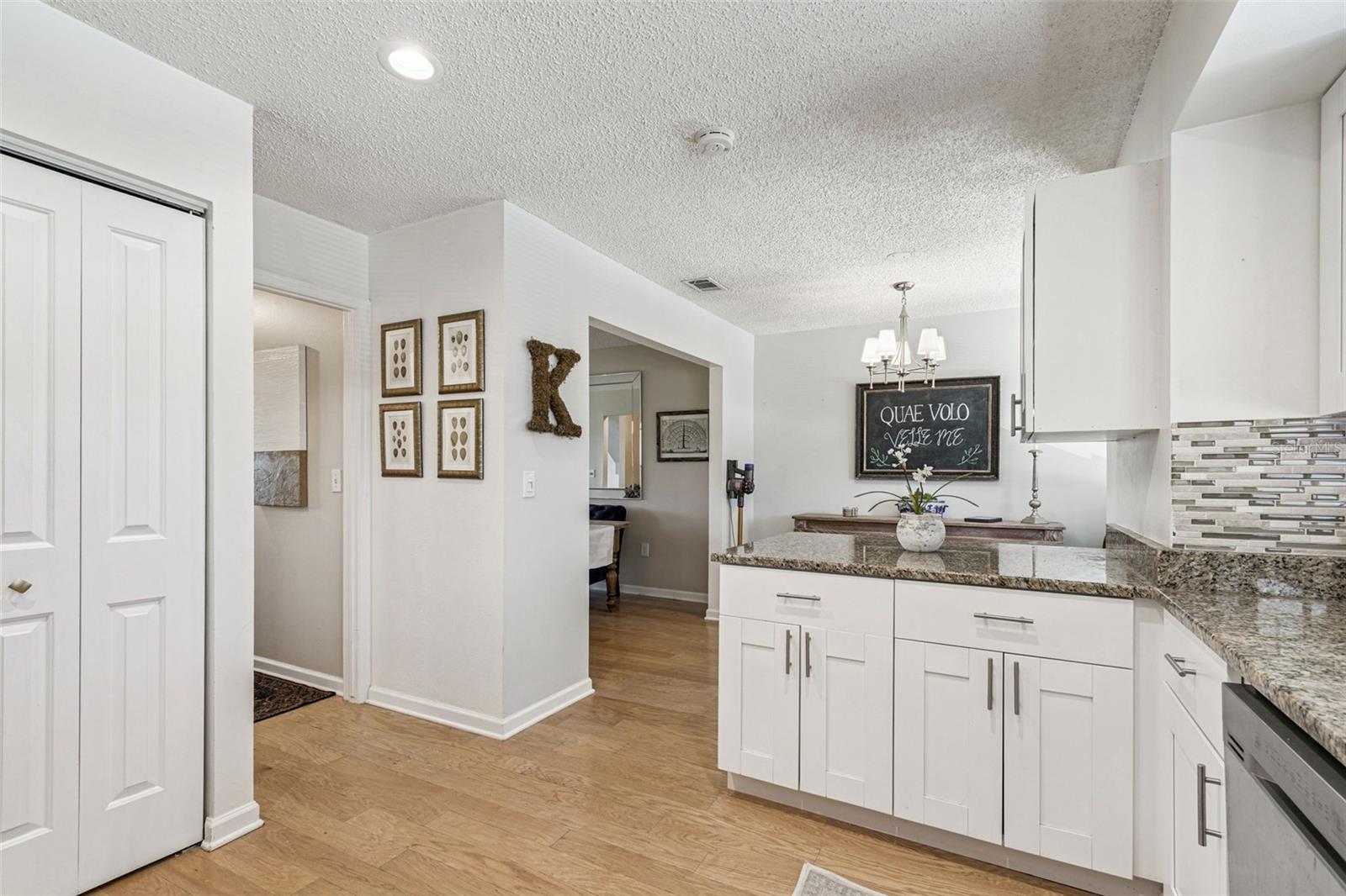Follow around from the corner of the pantry to a hall leading to the bath.