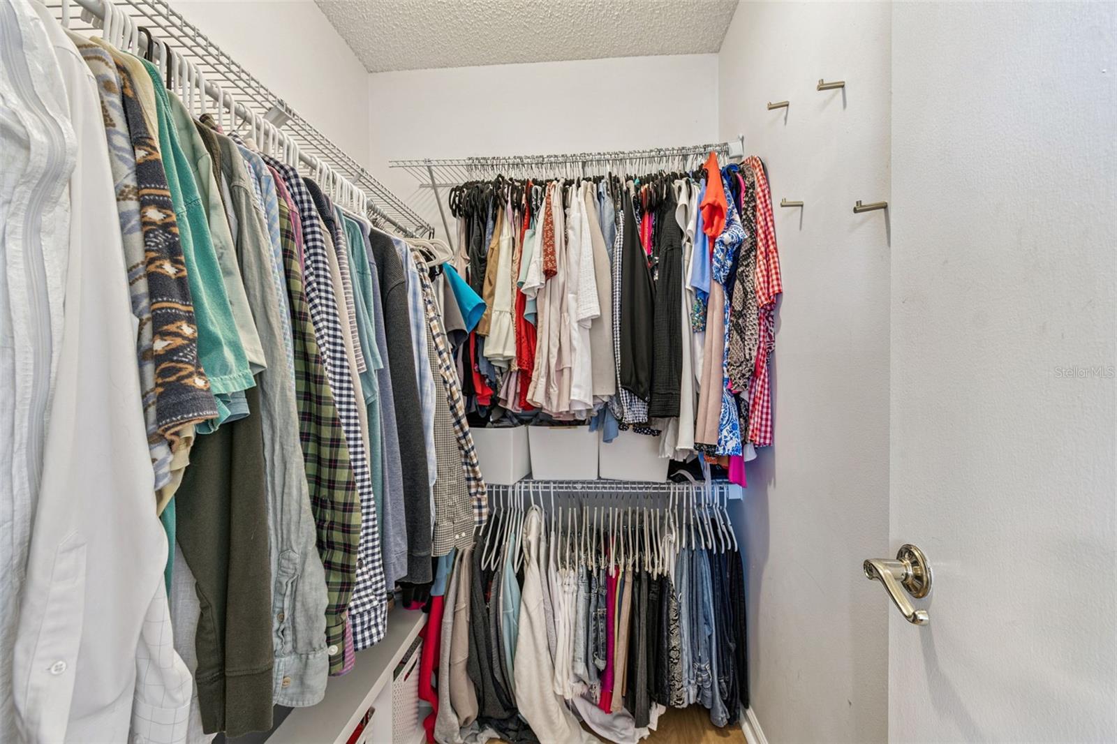 Primary walk-in closet...