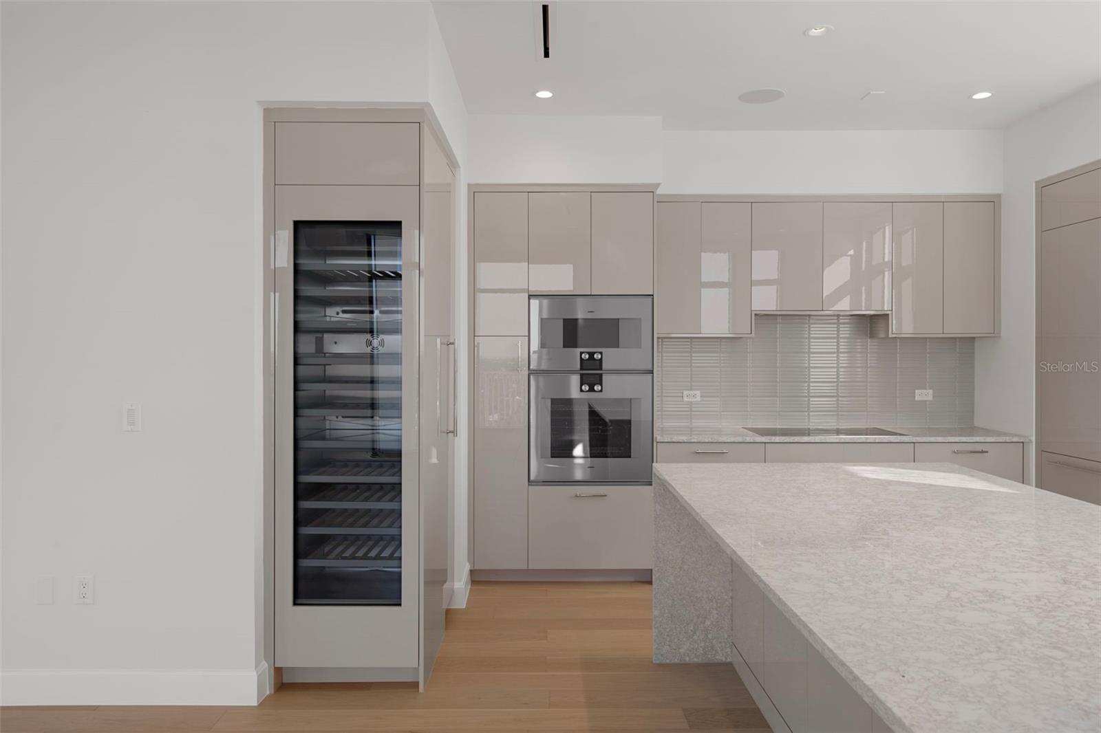 Gaggenau appliances and Blanco sink.