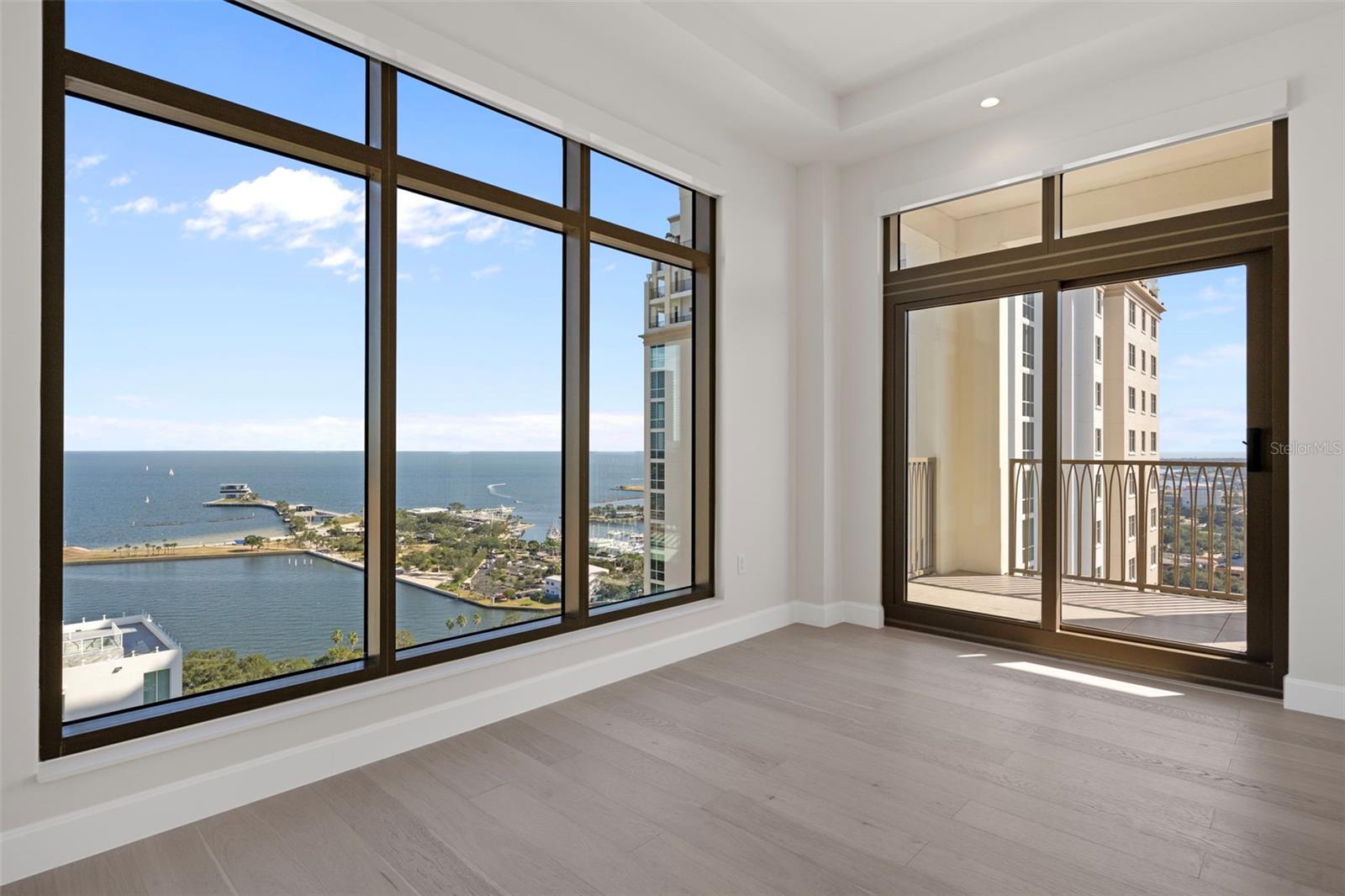 Serene owner’s retreat with terrace access.