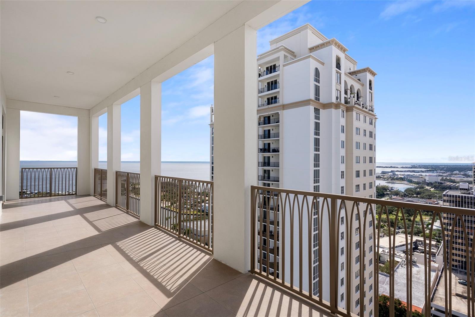 38-ft South-facing terrace spanning the primary suite and back west-facing guest room.