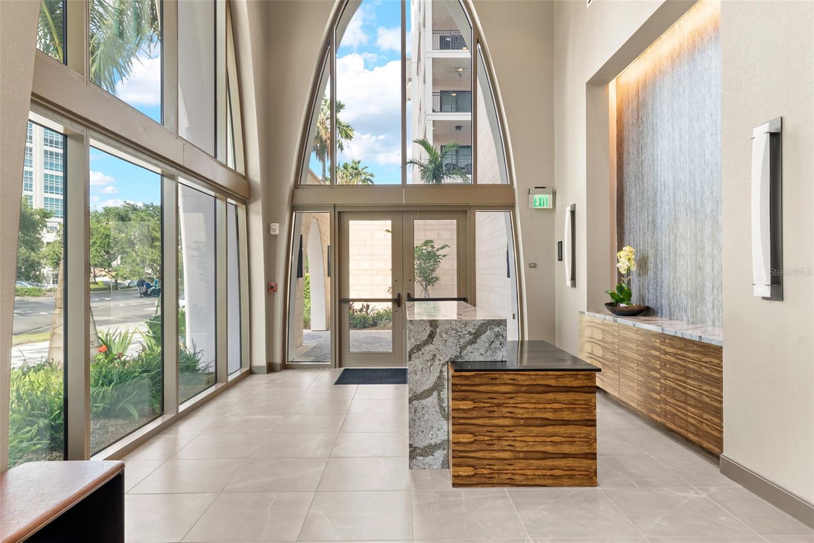 Elegant lobby with concierge service. Secure access.
