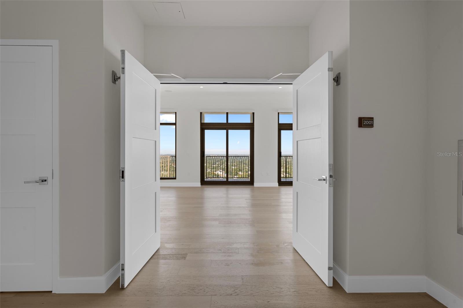 The elevator opens directly into your private foyer—double-door entry.