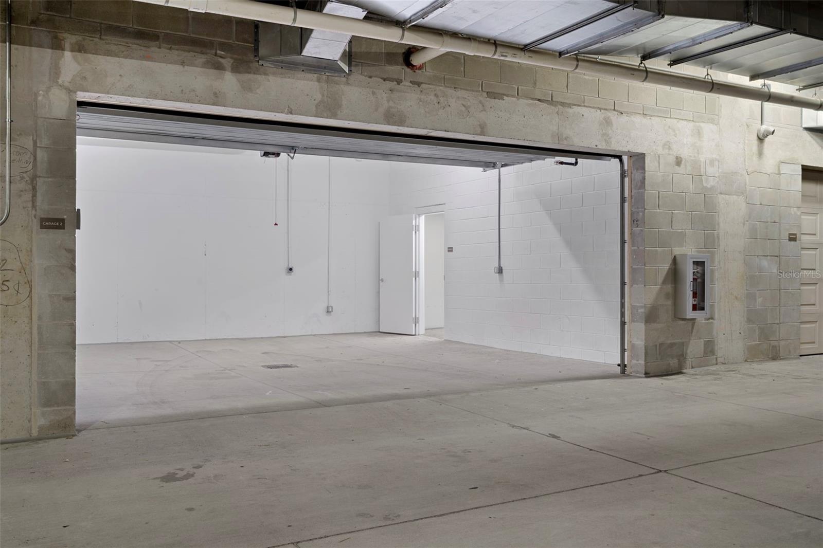 Large climate-controlled storage unit and EV charger in the private garage