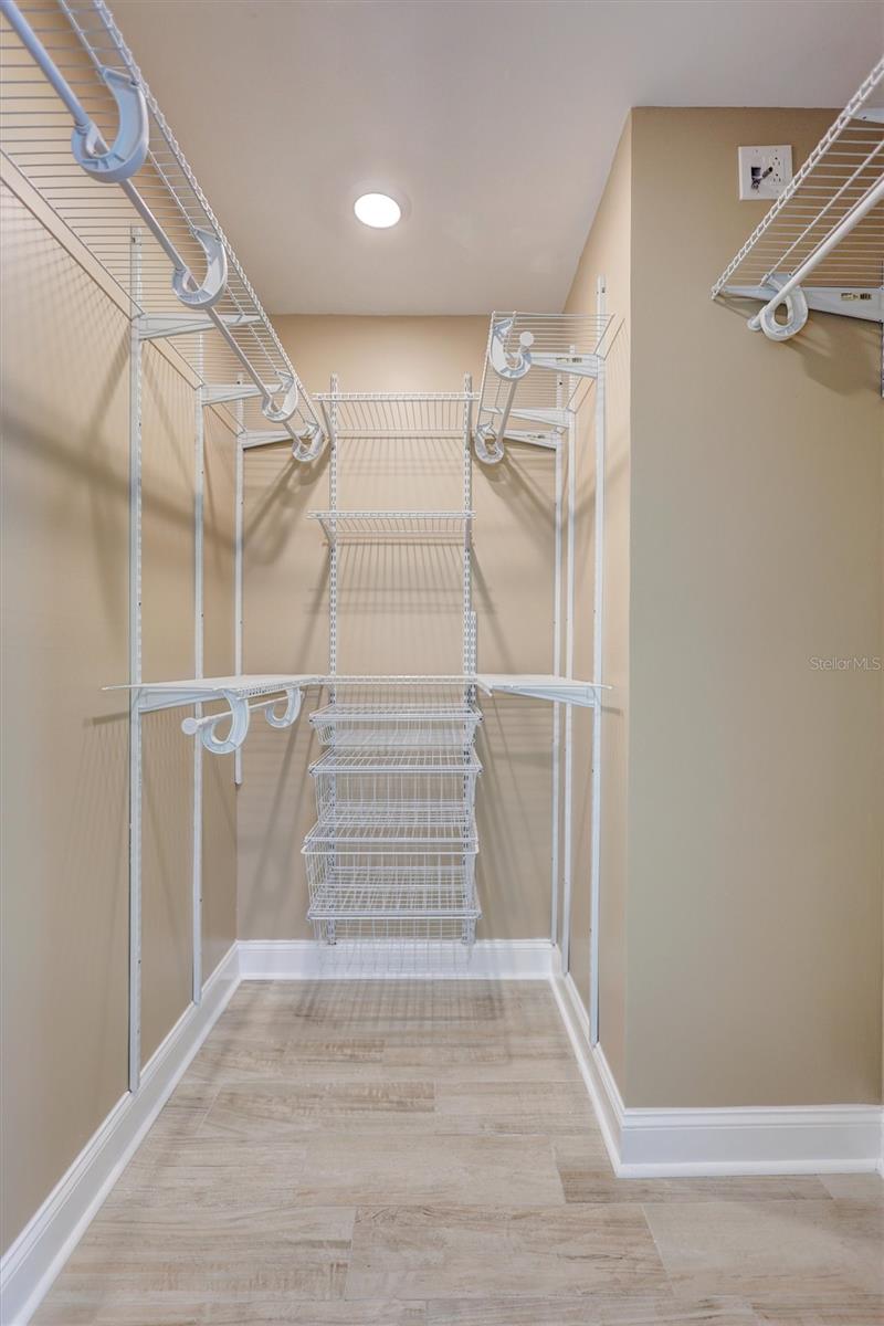 Walk in closet in the primary suite