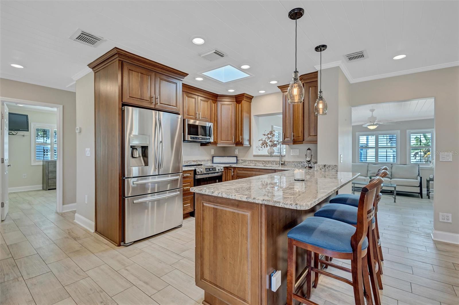 Kitchen opens to the living room