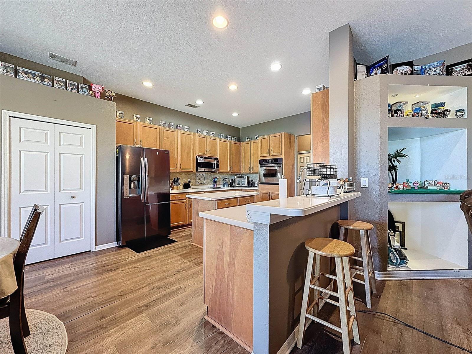 Kitchen Bar Open To Family Room