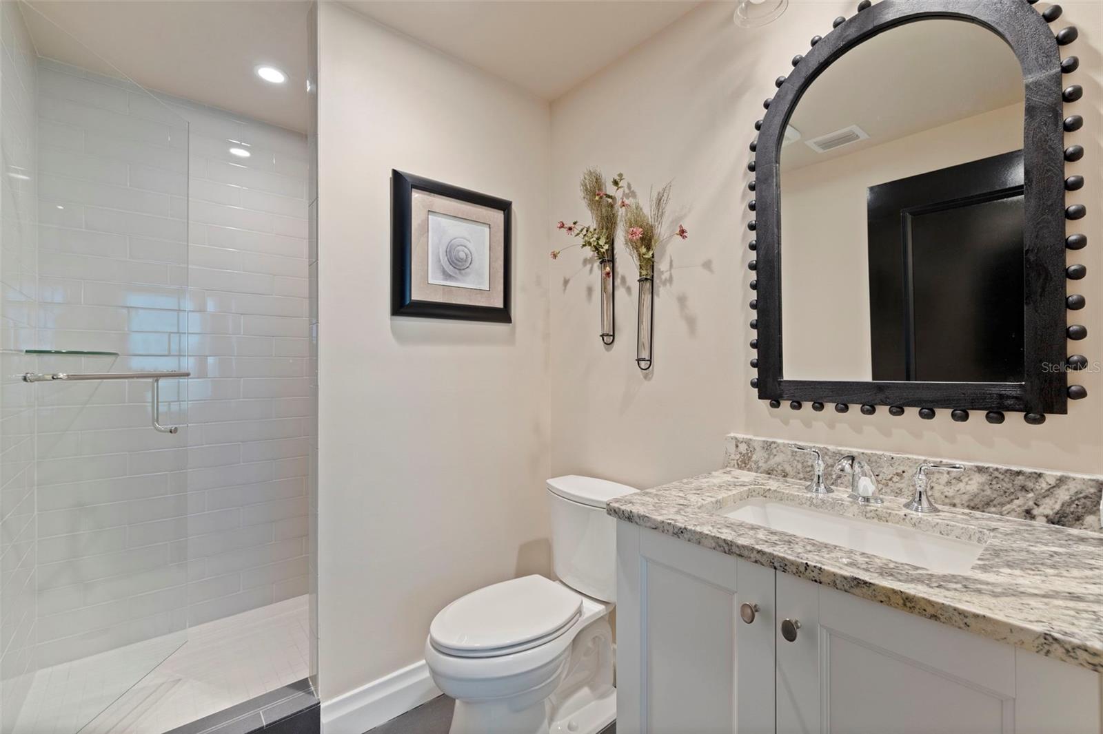 2nd Guest en-suite is light and bright.