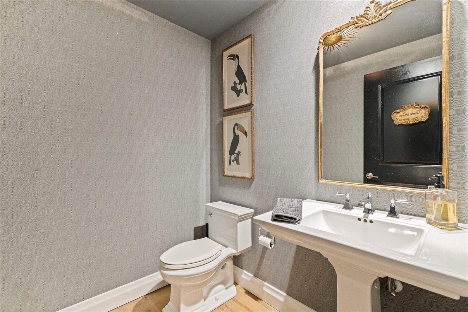 Elegant powder bath near the dining room.