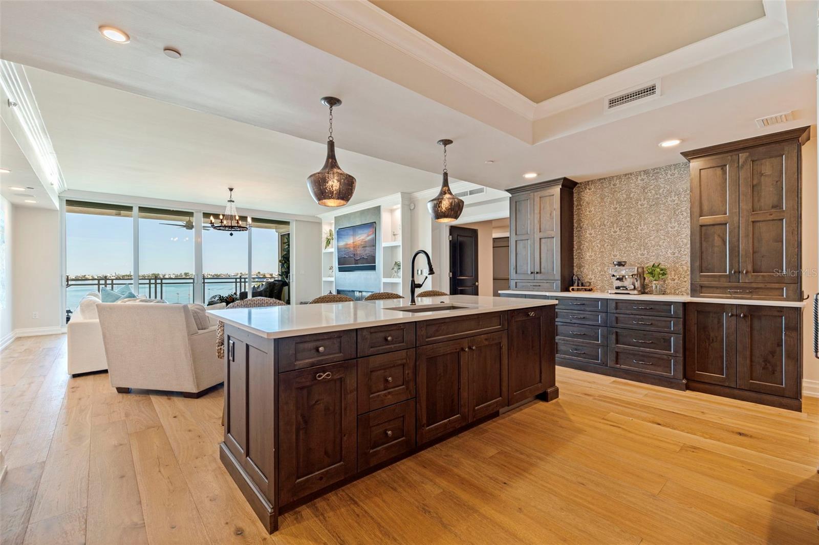 Custom kitchen with textured sophistication throughout.