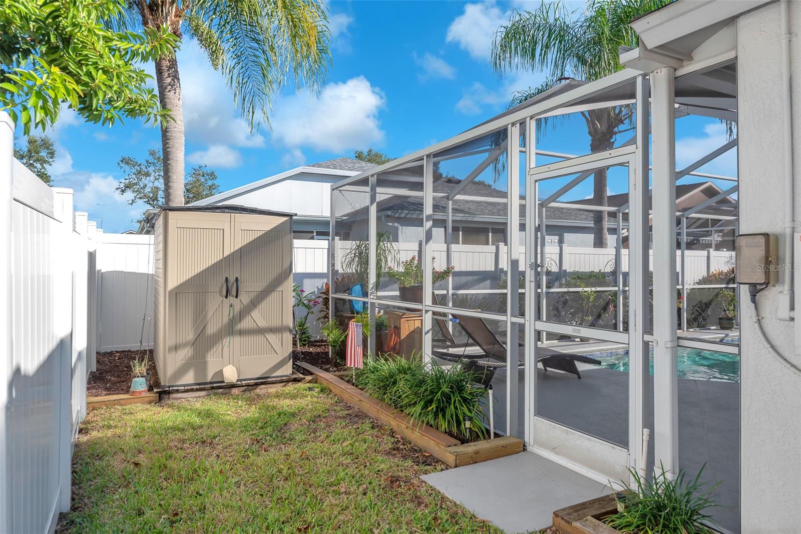 Enjoy a private fenced yard with room for a dog to exercise on both sides and a shed for extra storage.