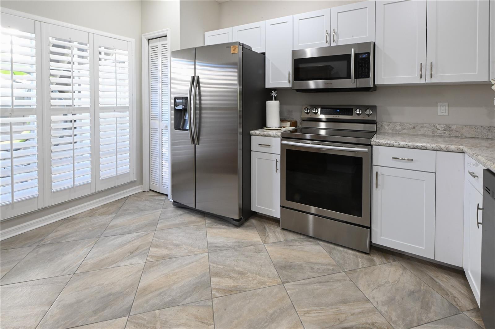 Kitchen With Beautiful Window w/Shutters