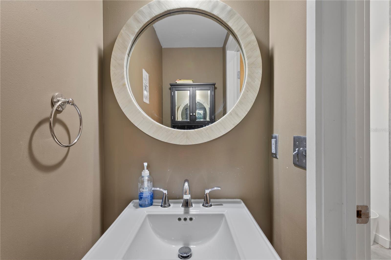 Convenient half bath available for guests