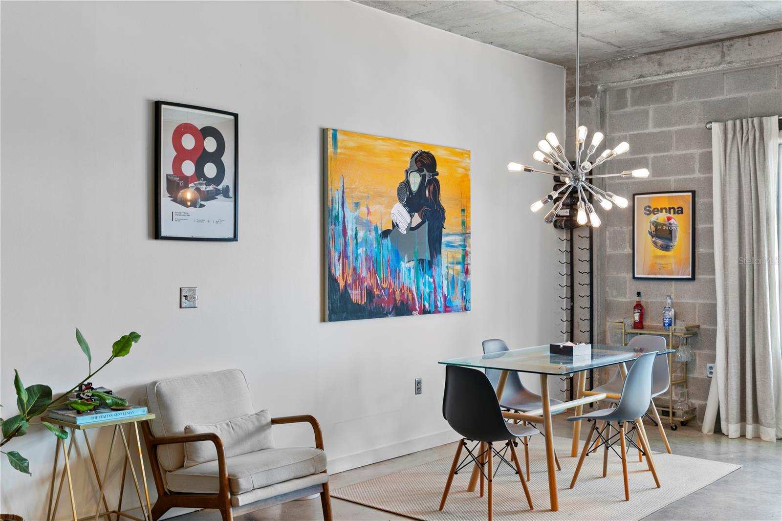 Chic dining area with modern design, artistic accents, and an industrial loft vibe.