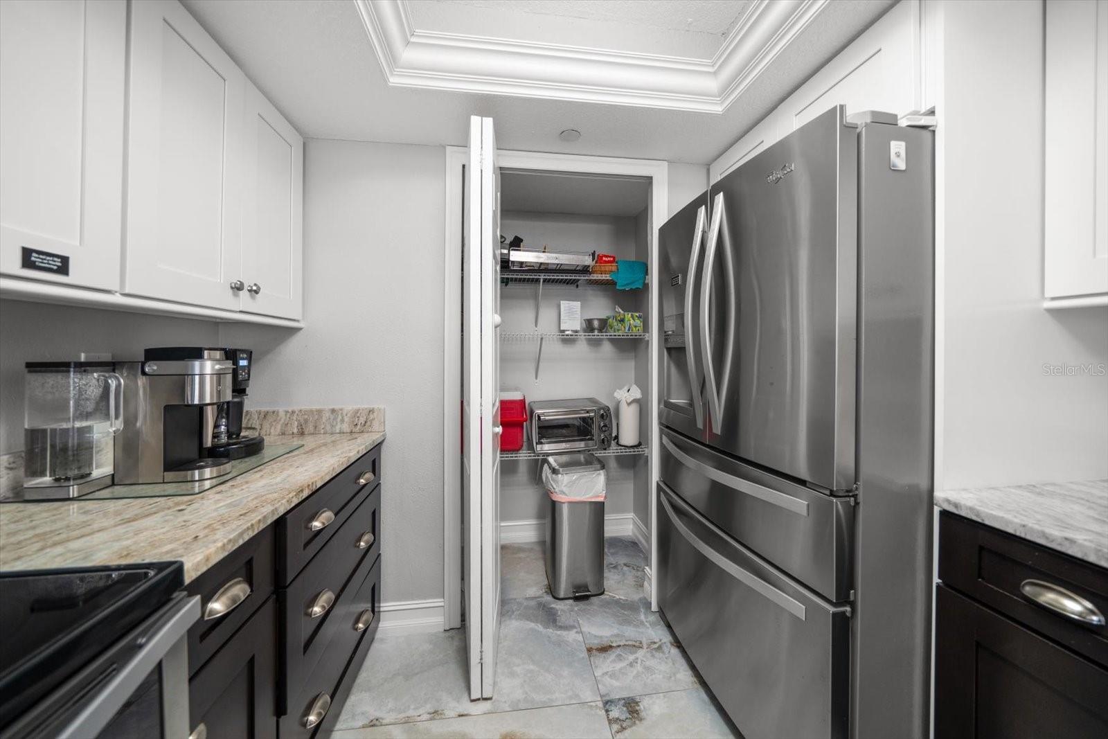 Large pantry with excellent storage.