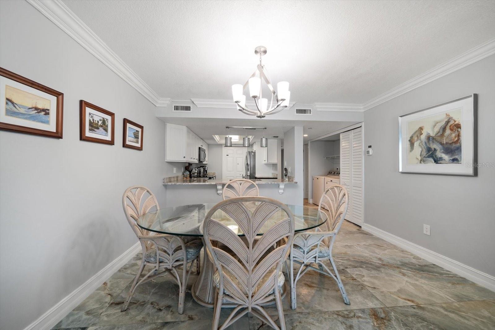 Dining area and breakfast bar for family and guests to gather.