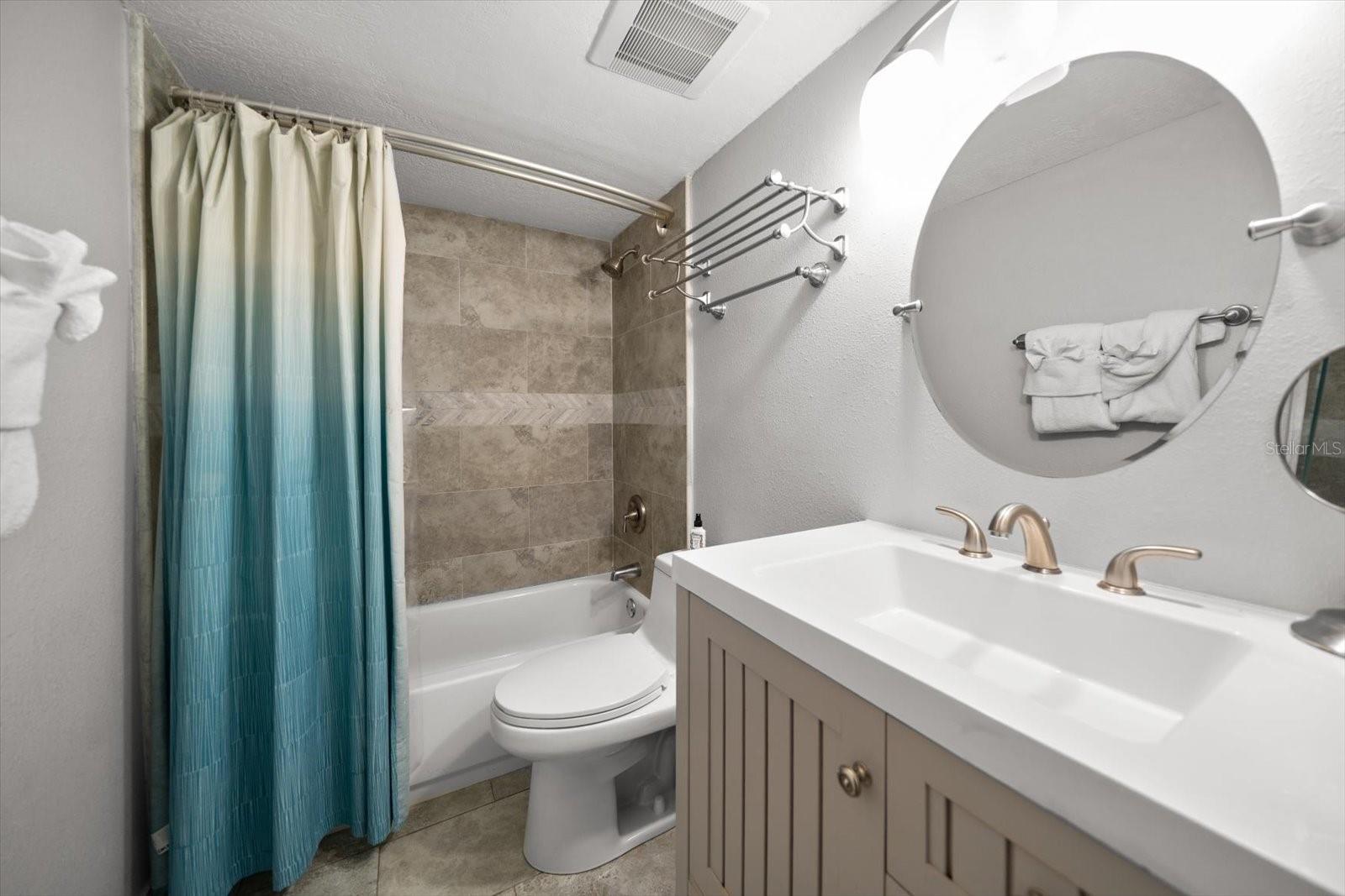 Beautifully finished second bath for additional guest bedrooms.