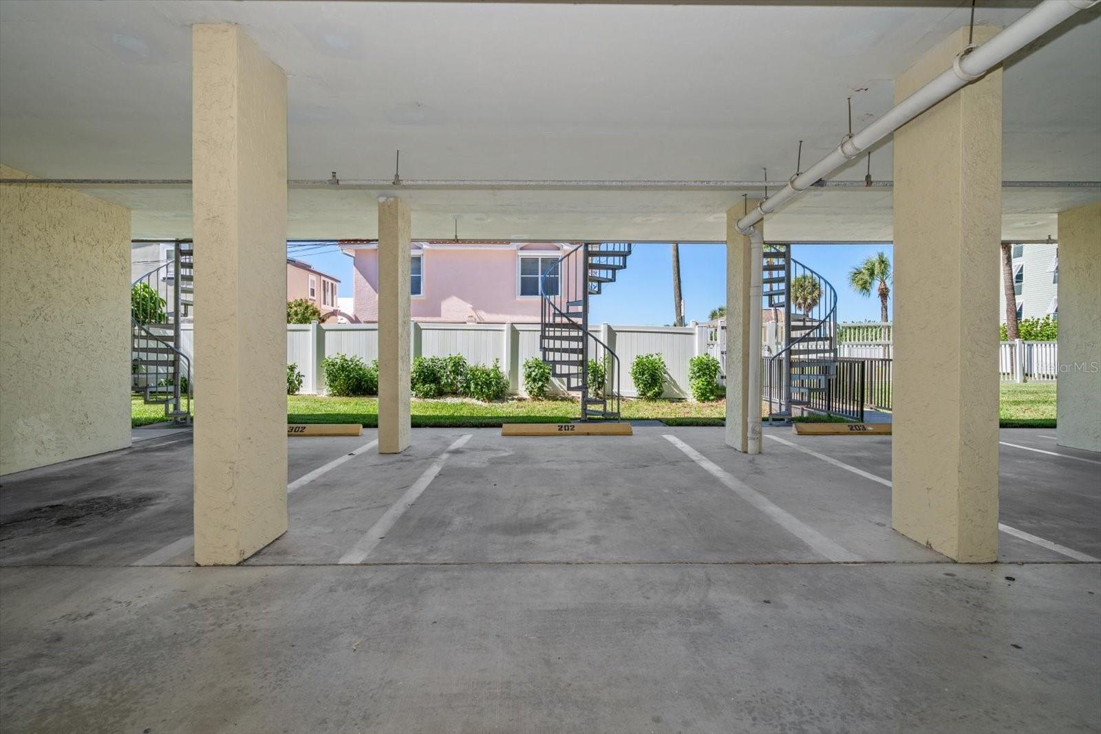 Assigned underbuilding parking-perfect location next to owner's personal staircase to unit's terrace.