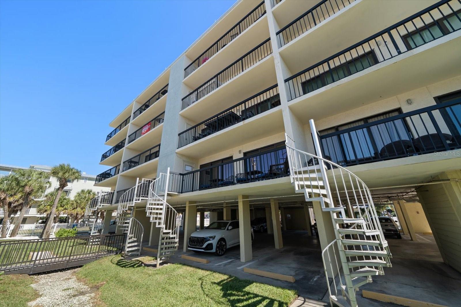 Perfect location on second level with convenient private staircase to pool and beach.