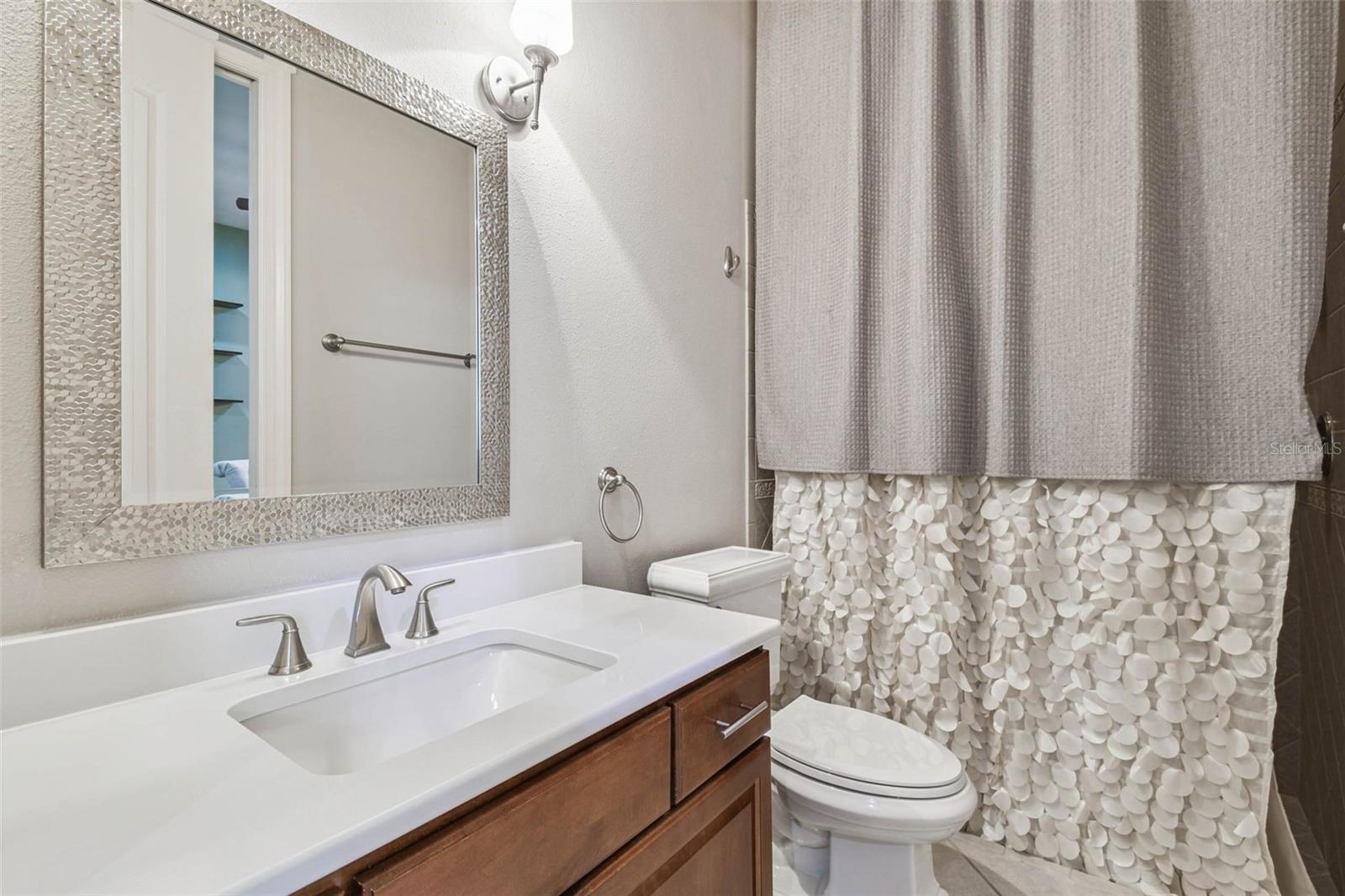 First Floor full Bath with access to Den/Bed 2