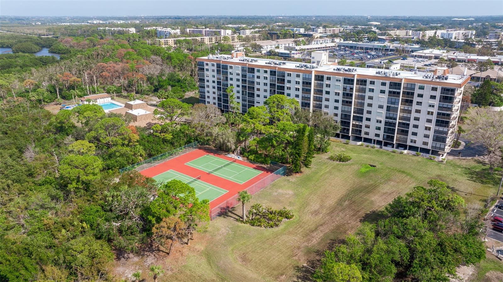 Two tennis courts, one of which has the pickleball lines painted on