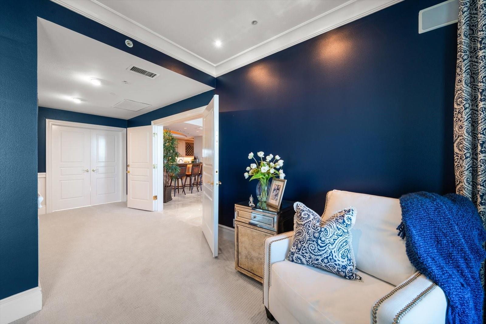 Entry to the sitting area in the primary suite-imagine pure relaxation in a world of comfort.