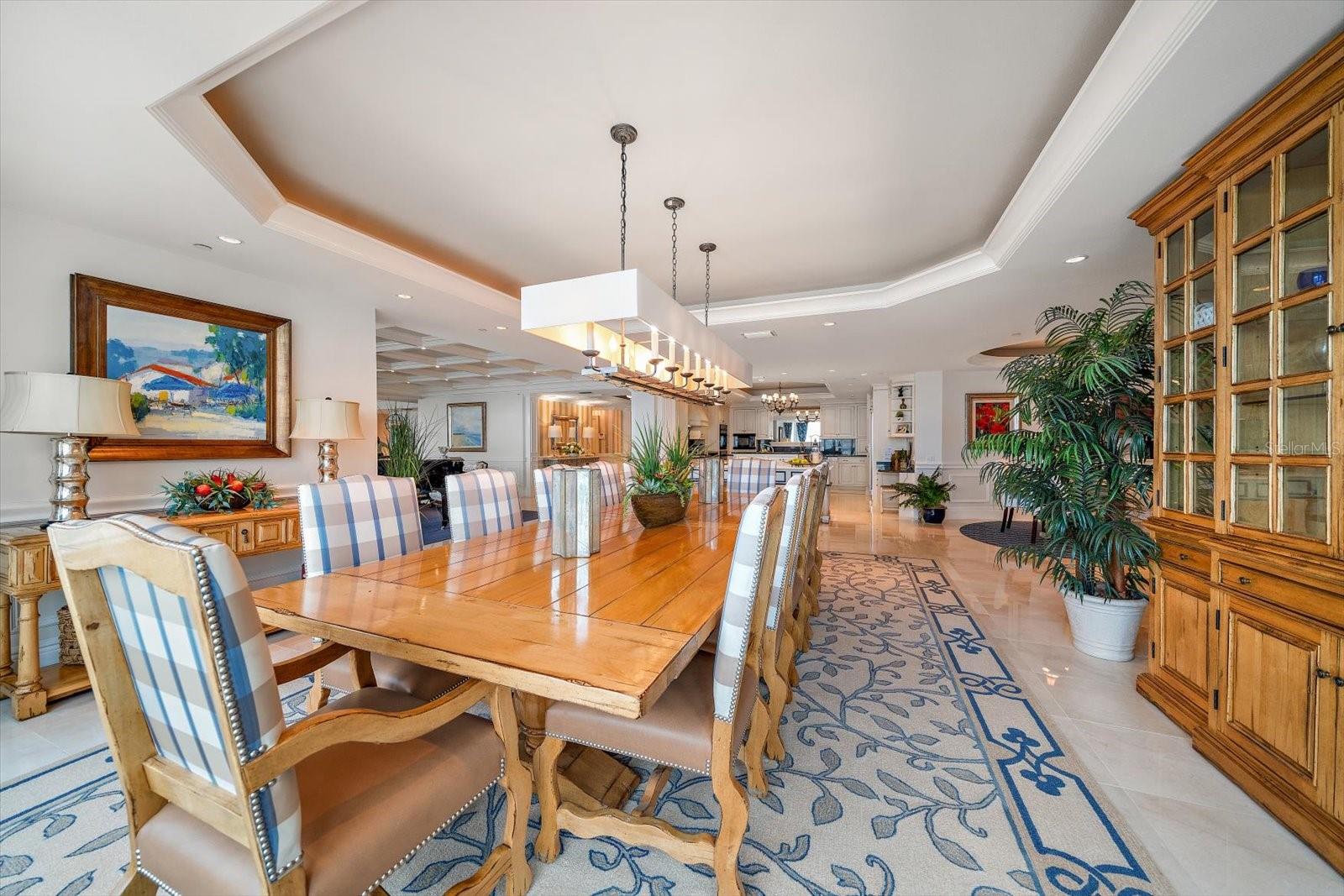 Hosting large gatherings or family get-togethers is ideal in the formal dining room, offering seating for at least 12, showcasing spectacular open views of the Intracoastal to the Gulf!