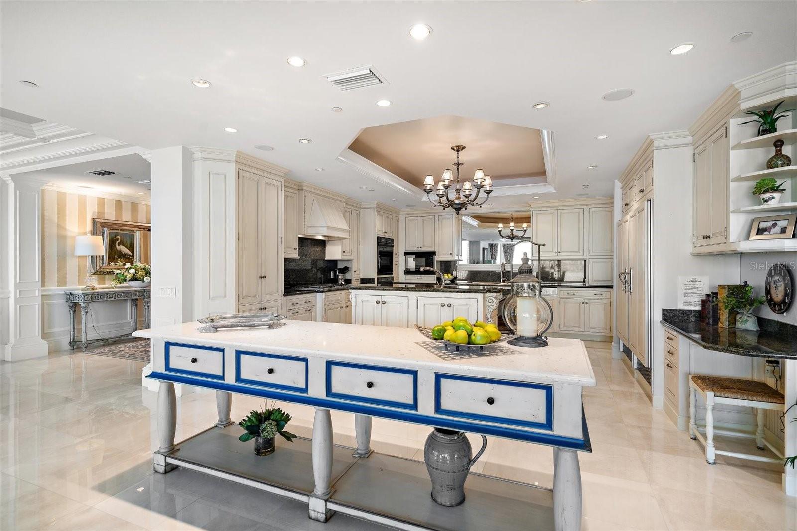 Refined luxury is evident in the tastefully appointed kitchen, providing ample workspace and high-end appliances.