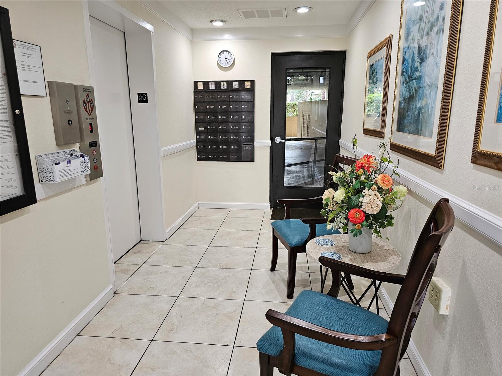 Entry foyer-Elevator-Mailbox