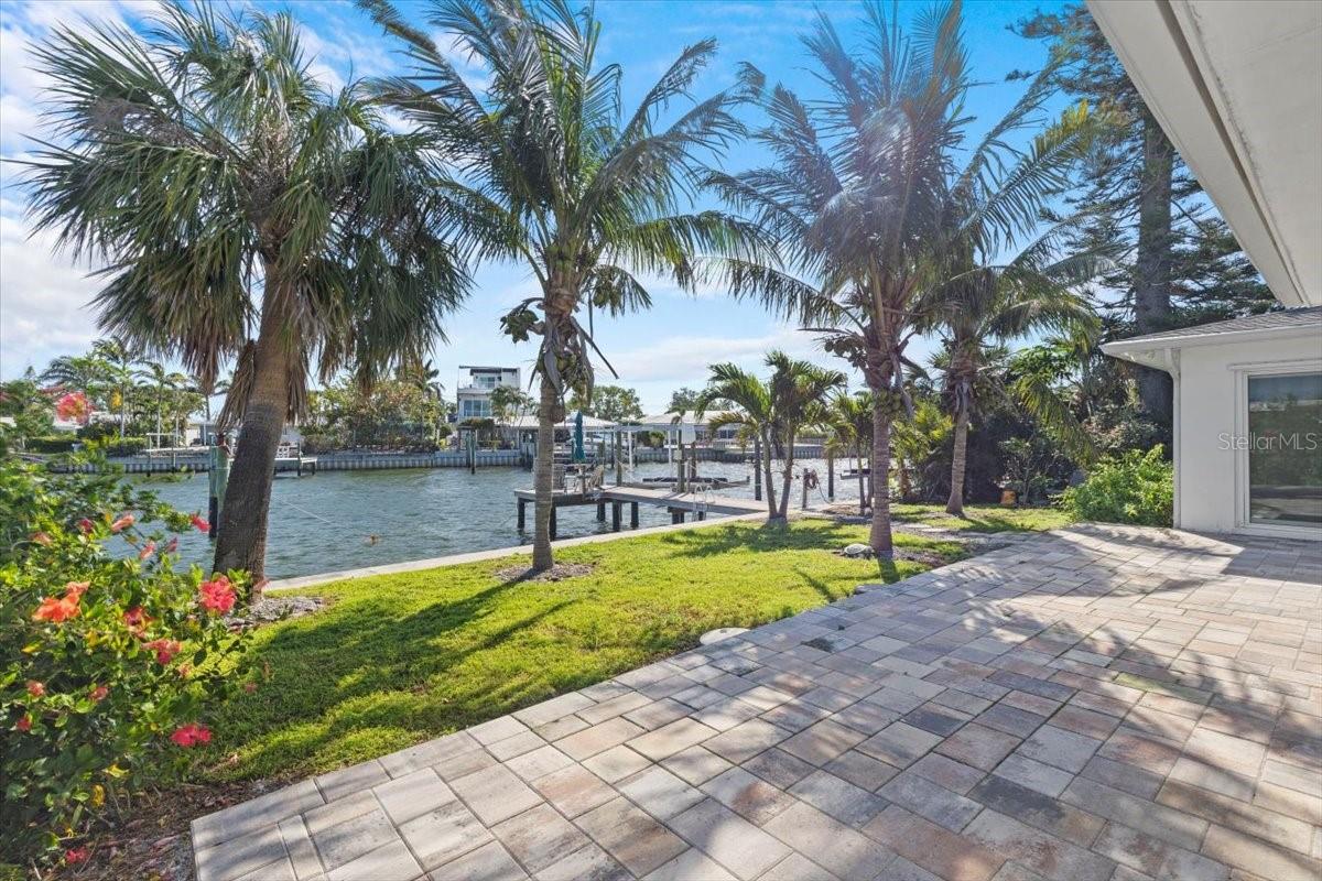 Backyard Waterfront Patio, Yard and Dock w/ Lift