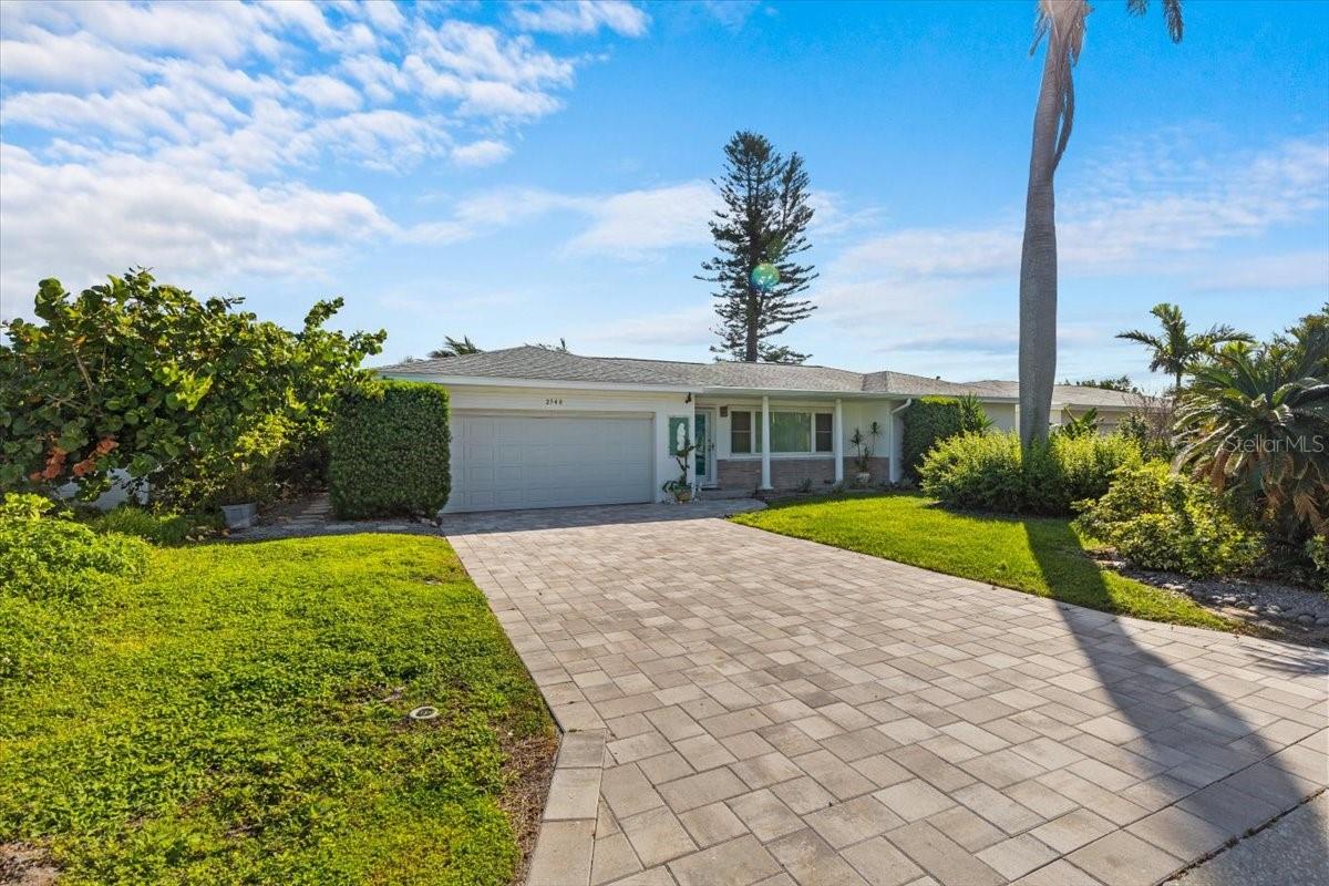 Front of home w/ new pavered Driveway
