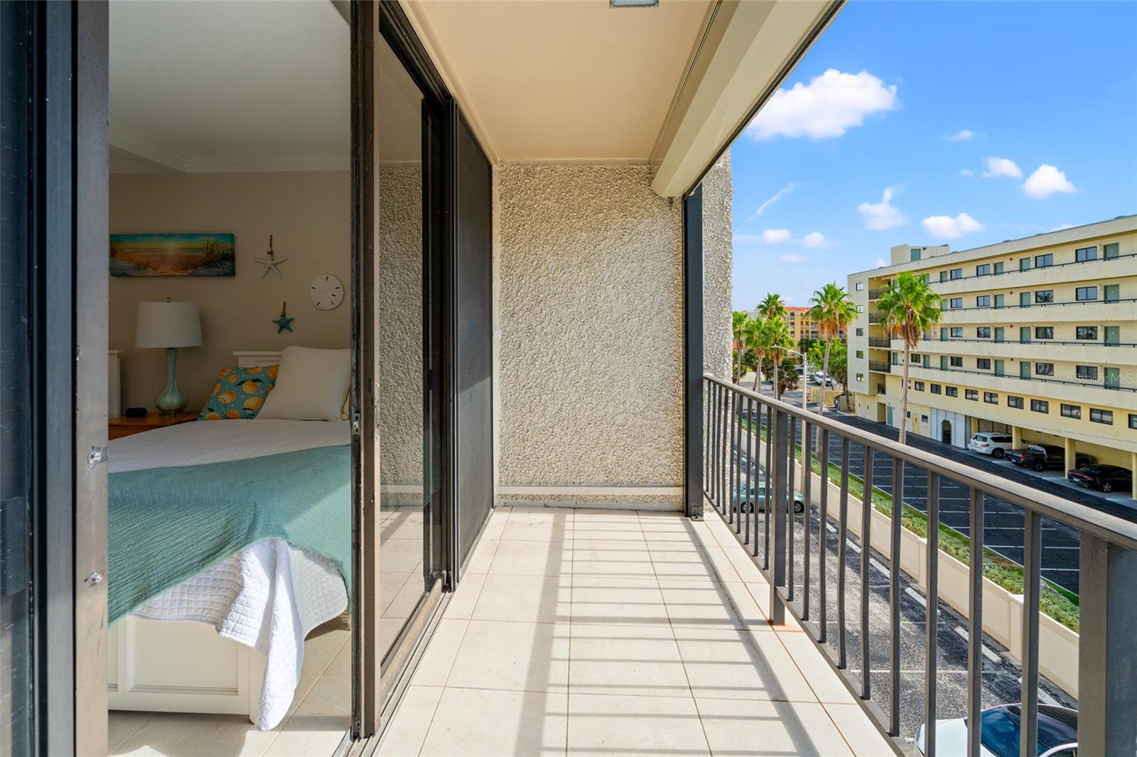 Large balcony space with hurricane shutters