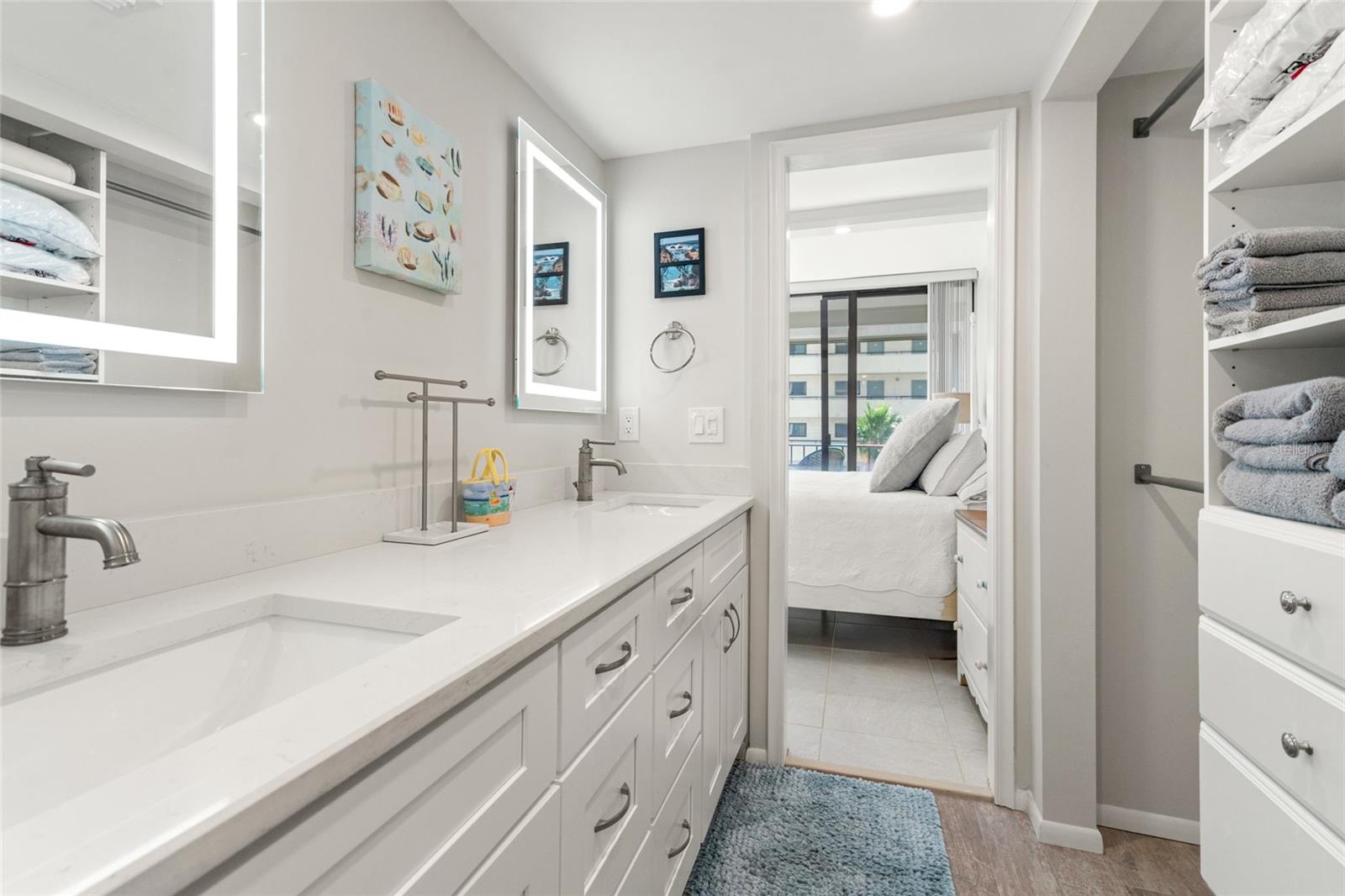 Primary bathroom dual sinks quartz countertops