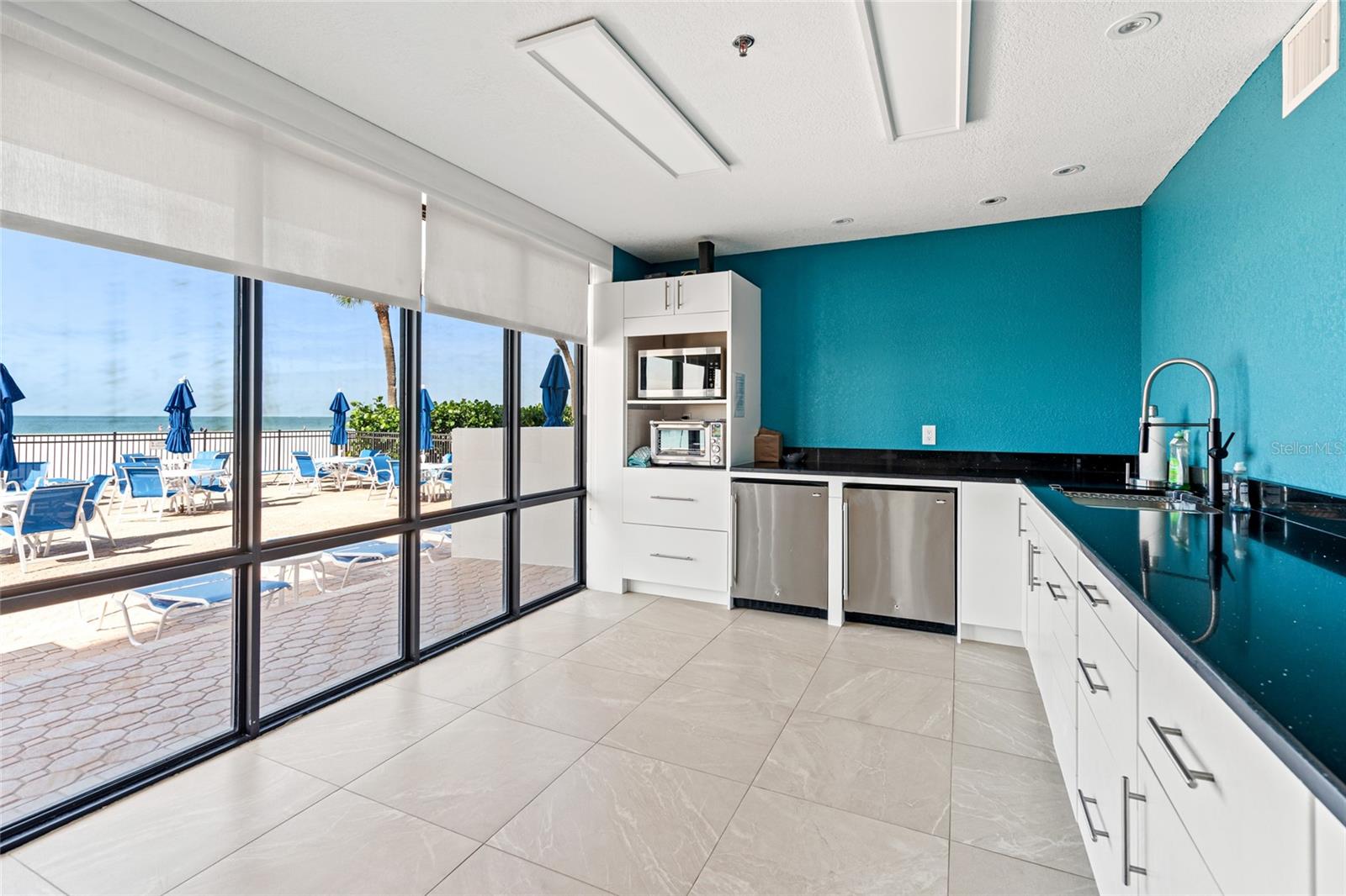 Rec room kitchen for private parties right off the pool deck