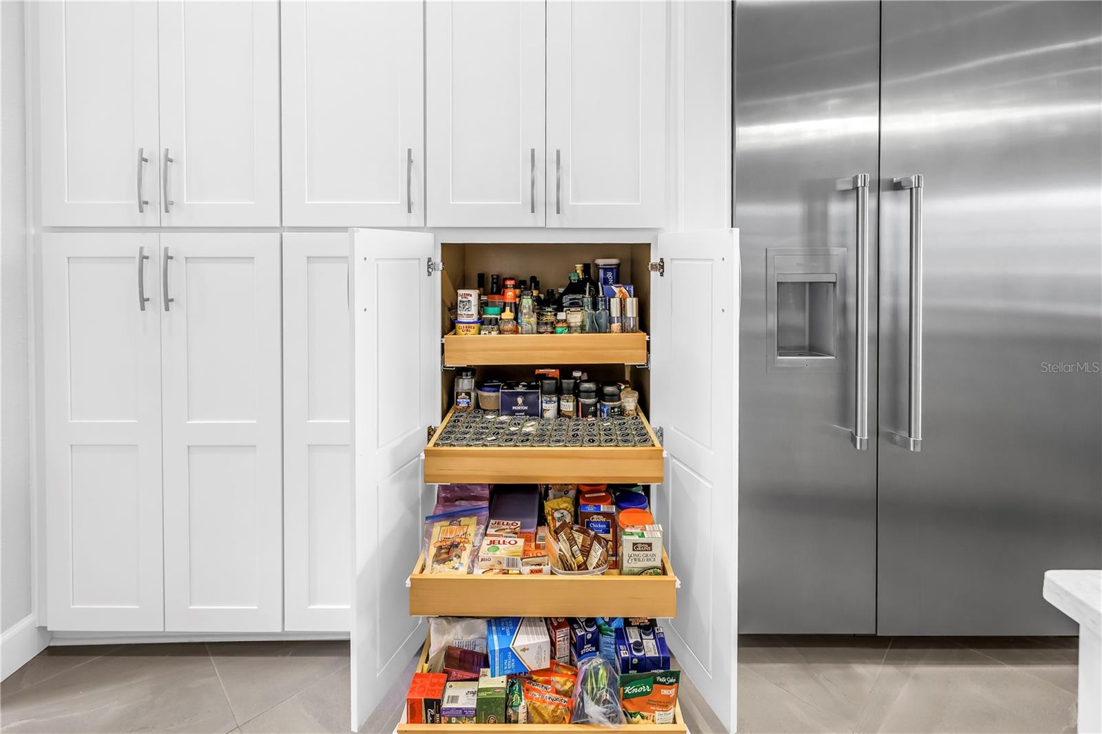 Ample storage featuring roll out drawers