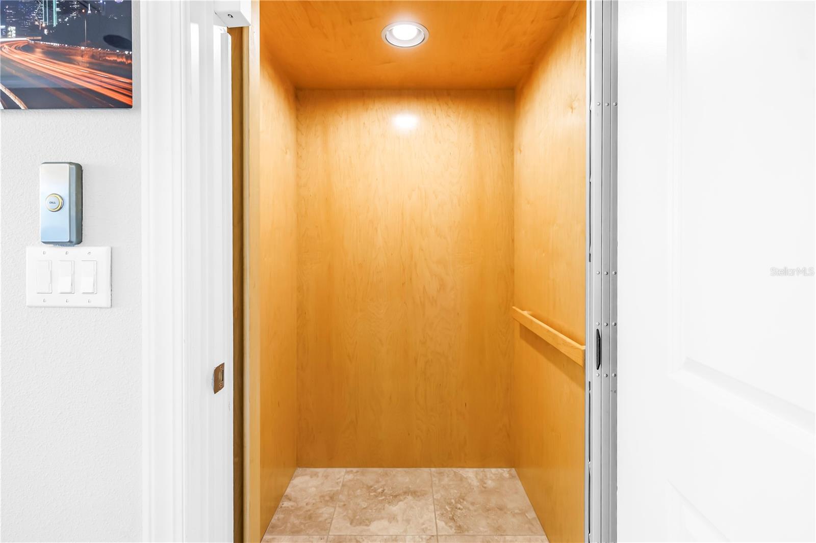 Private Elevator servicing all three floors