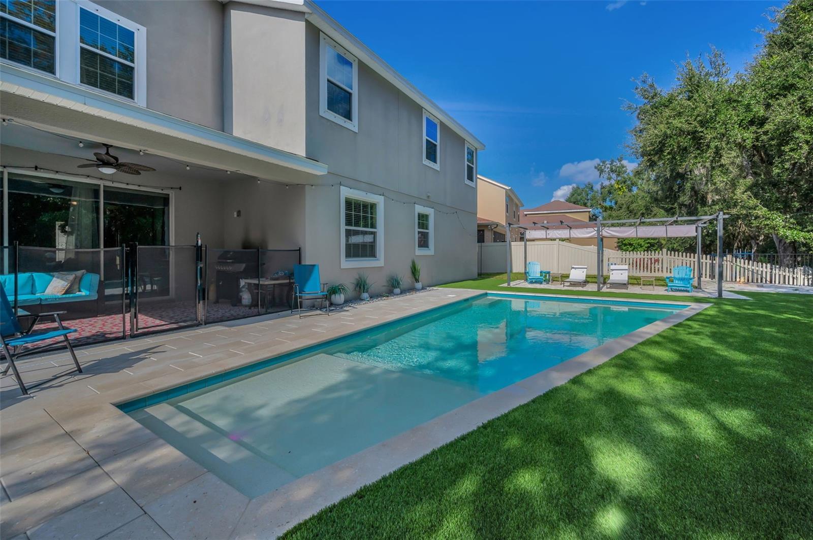 pool, lanai, and beach area pergola