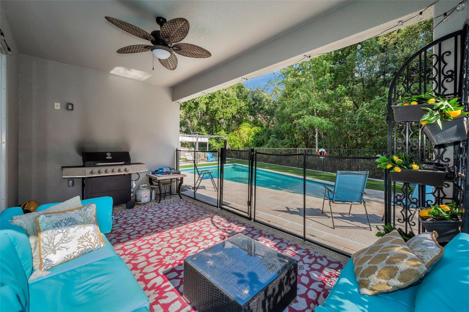 lanai, pool, and beach area pergola