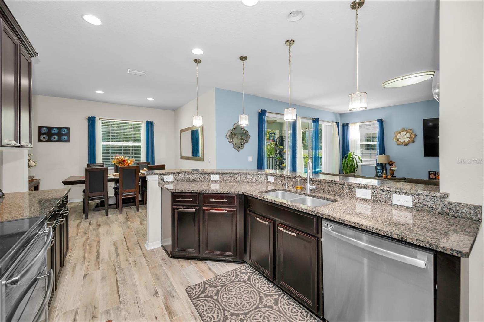 kitchen, dining room, and family room