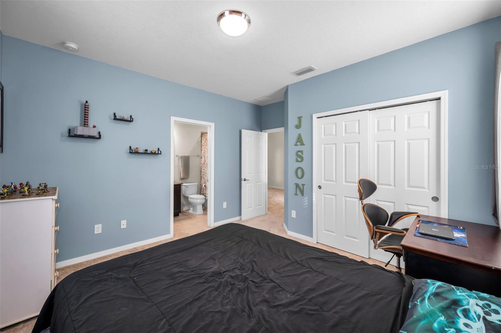2nd master bedroom looking toward entrance and its ensuite bathroom
