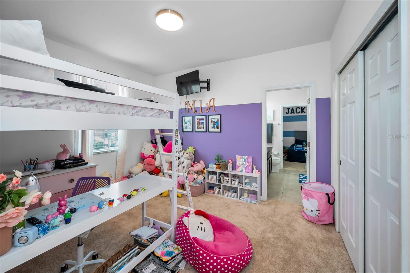 1 of 2 of the Jack/Jill bedrooms looking towards the shared Jack/Jill bathroom
