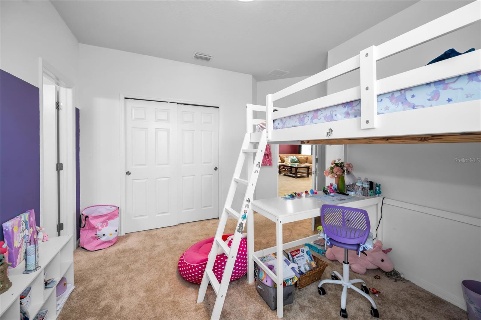 1 of 2 Jack/Jill bedrooms looking toward its closet and entrance
