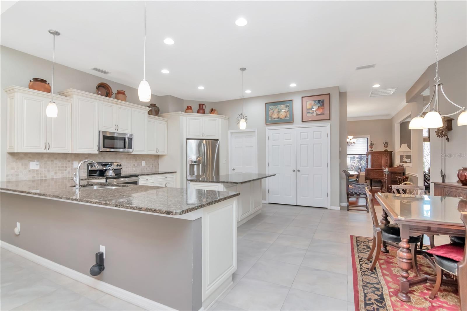 Fully updated kitchen with stainless steel appliances, large pantry, island AND breakfast bar