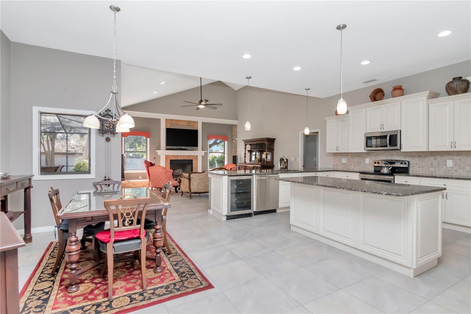 Kitchen, eat-in dining area and family room combo