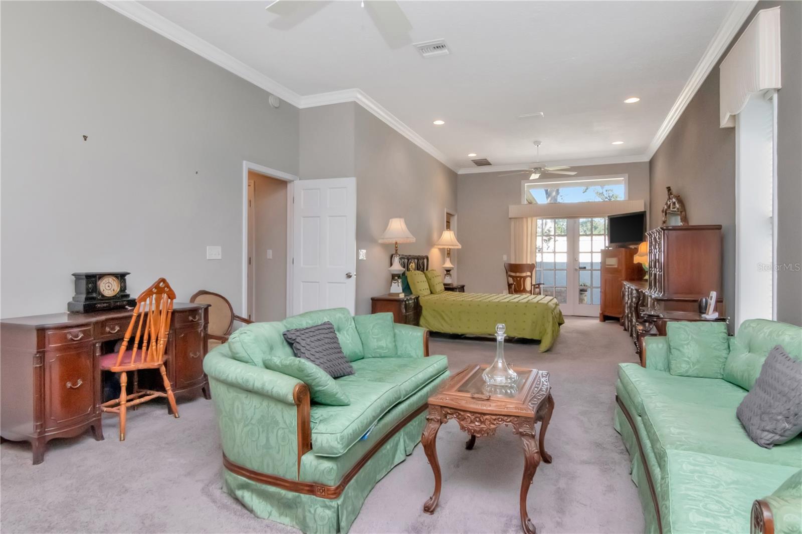 Primary Suite with private sitting area and a private courtyard