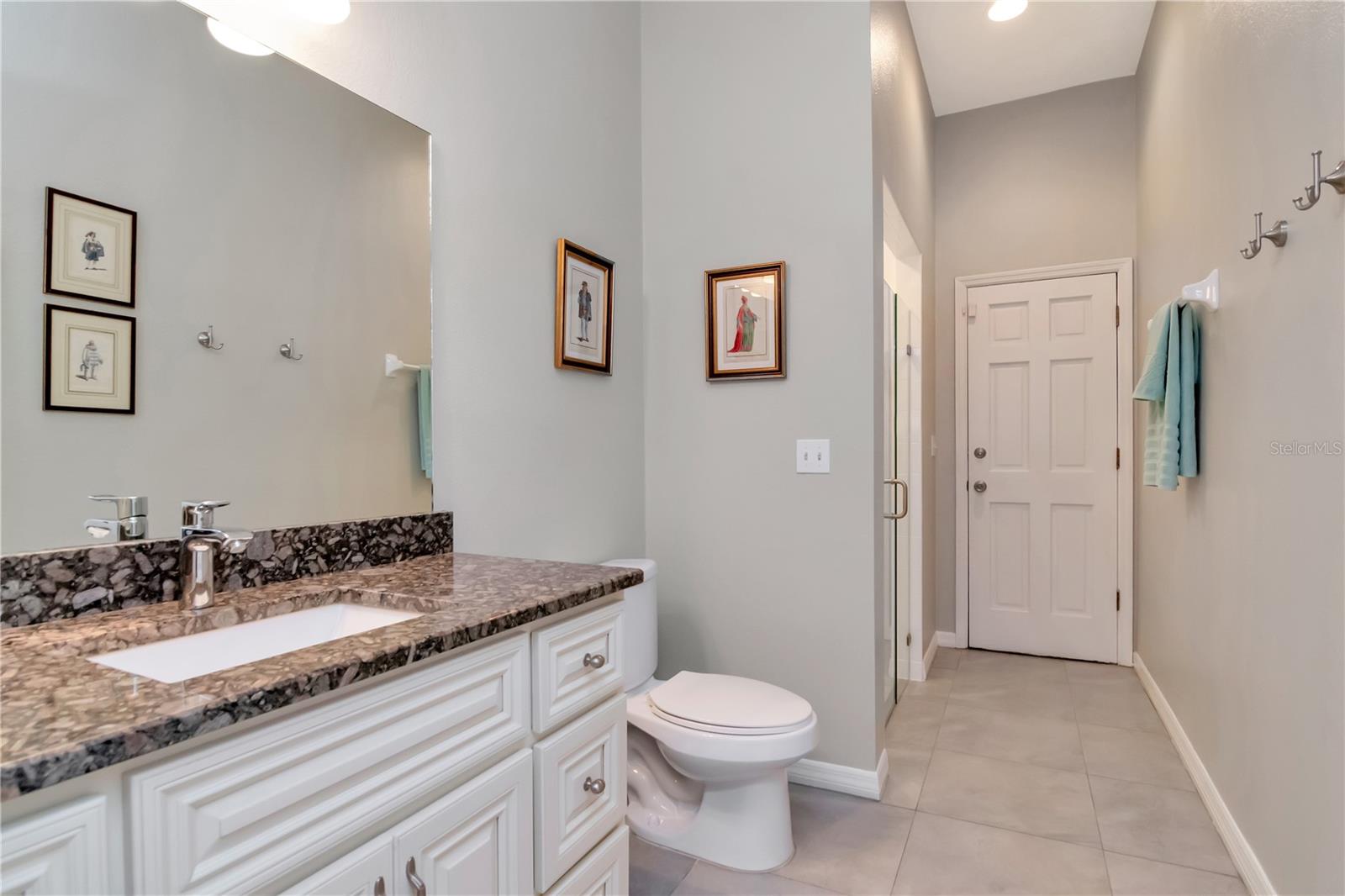 Pool/Guest Bathroom - access to pool