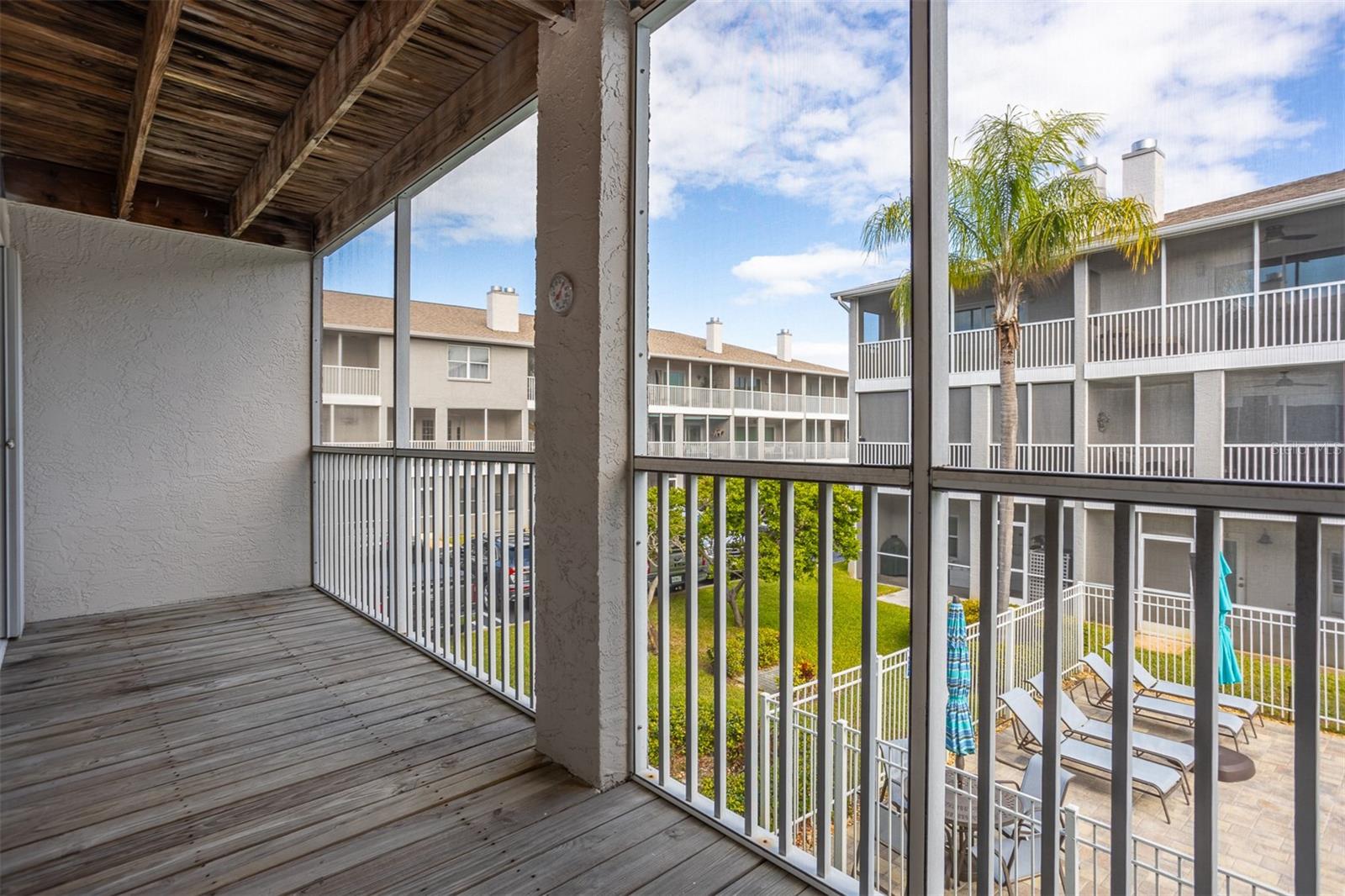 Poolside Balcony off of Living Rm